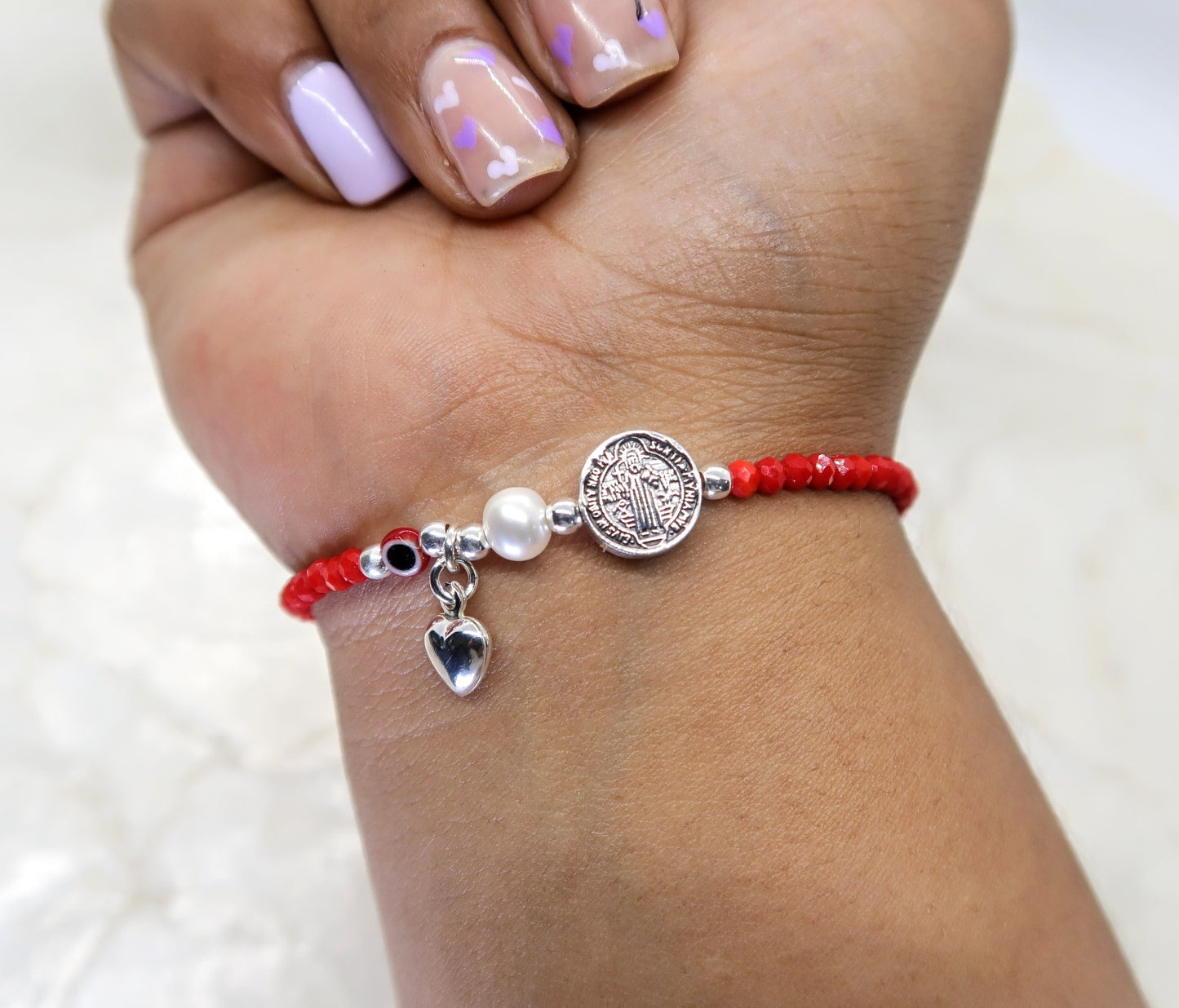 Pulsera San Benito, perla cultivada y ojo turco