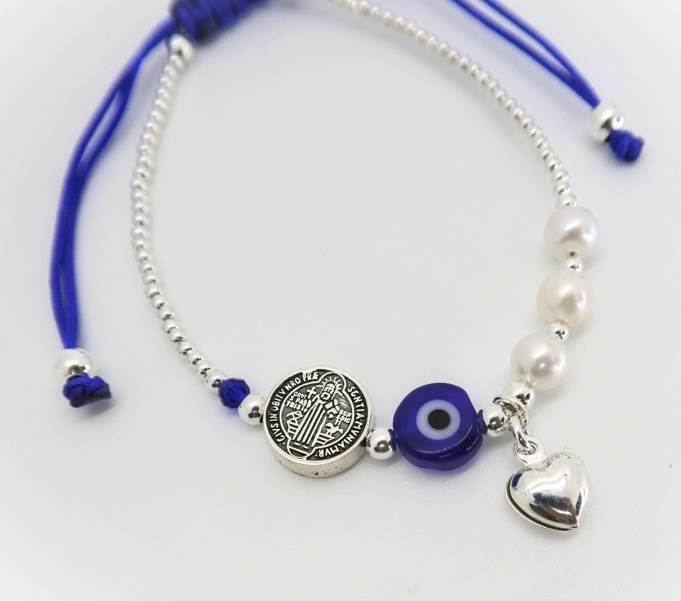 Pulsera San Benito, Ojo, Corazon de Plata