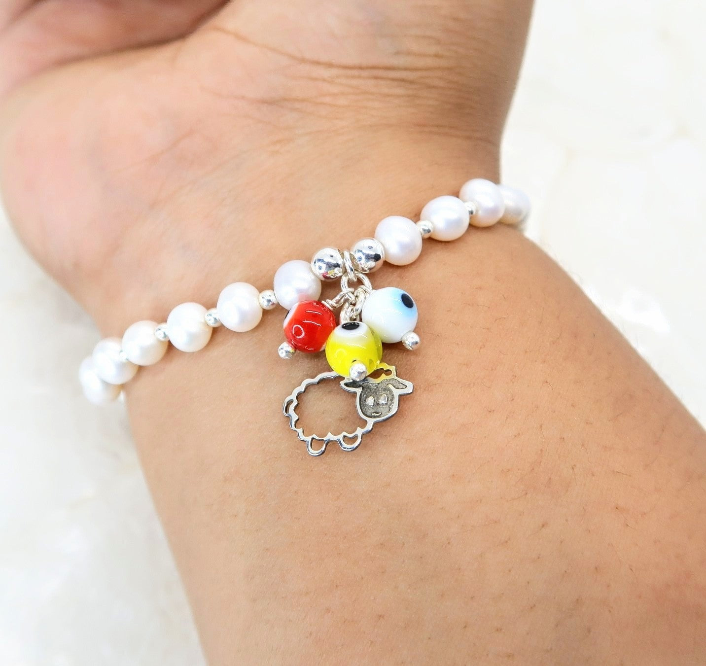 Pulsera Borreguito de la Abundancia con Perlas Cultivadas, Ojo turco